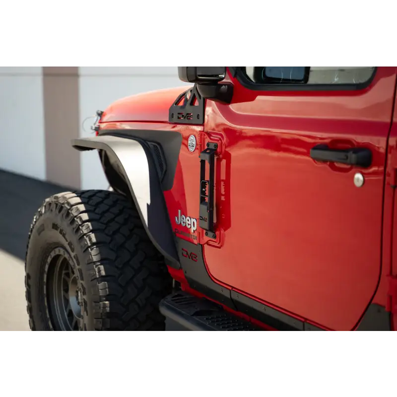 Red Jeep with black bumper and tire in DV8 Offroad 07-23 Jeep Gladiator/Wrangler JT/JK/JL Hinge Mounted Step