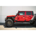 Red Jeep with black bumper and wheels: DV8 Offroad 07-23 Hinge Mounted Step for Jeep Gladiator/Wrangler.
