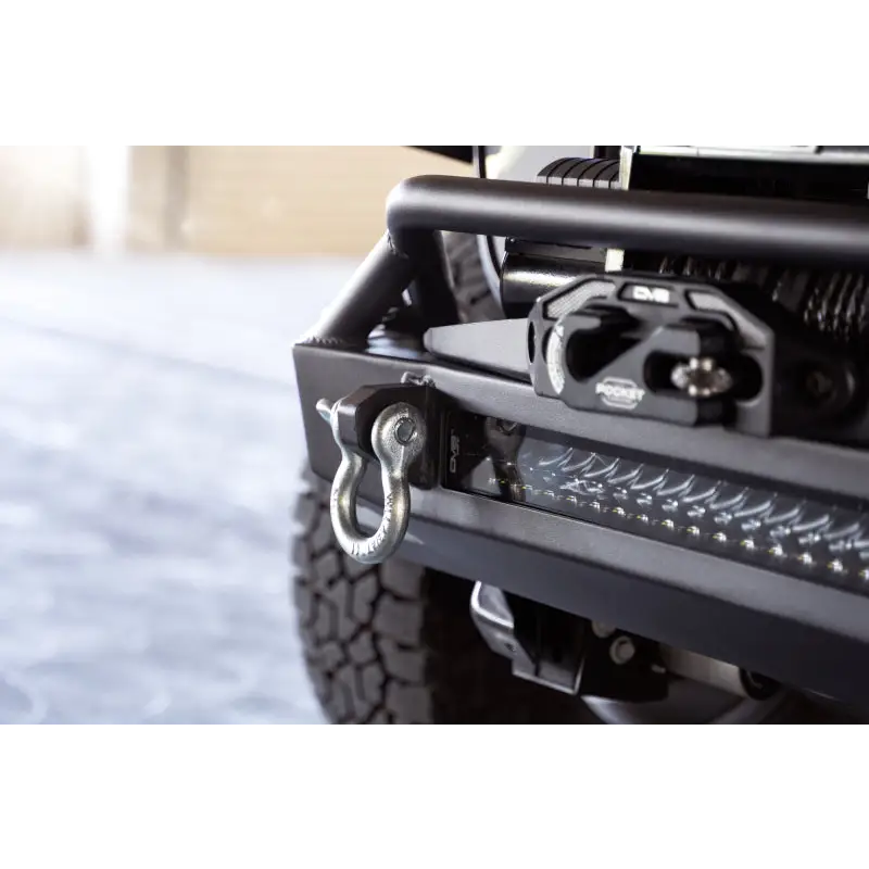 Close-up of Jeep Wrangler with winch on DV8 Offroad FS-1 Series Stubby Front Bumper