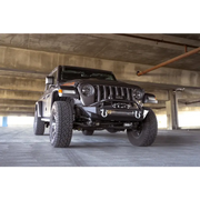 DV8 Offroad Jeep Wrangler parked in spacious garage