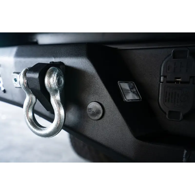 Black metal latch with metal ring on DV8 Offroad 16-23 Toyota Tacoma MTO Series Rear Bumper