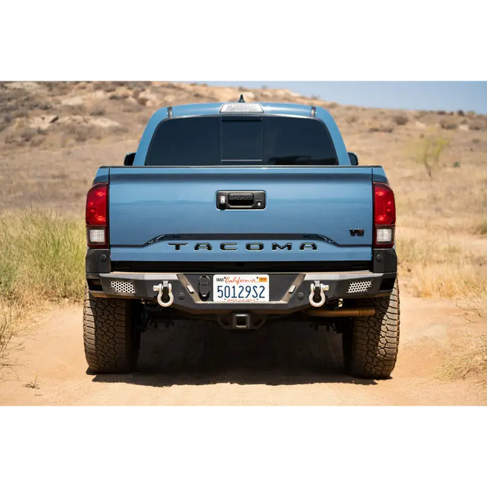 Blue truck MTO Series rear bumper by DV8 Offroad