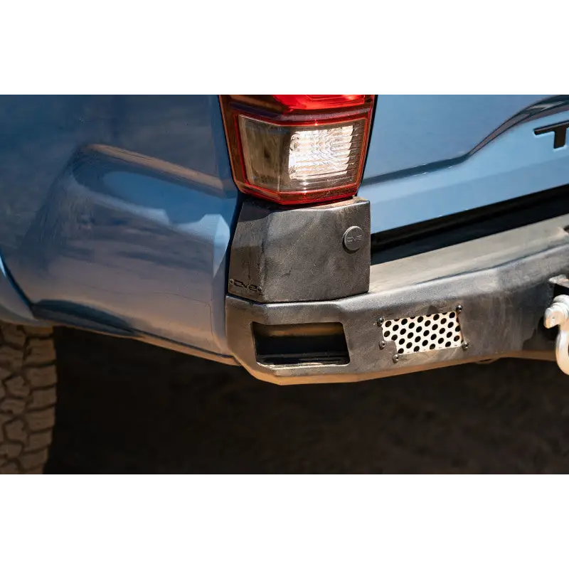 Close up of DV8 Offroad MTO Series Rear Bumper on blue truck