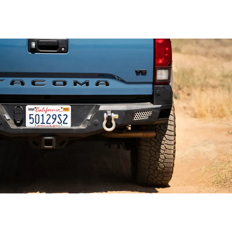 Blue truck with license plate - DV8 Offroad 16-23 Toyota Tacoma MTO Series Rear Bumper
