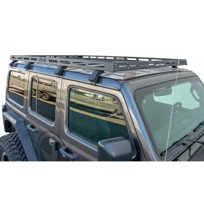 Black Jeep Wrangler JL 4-Door with Roof Rack by DV8 Offroad