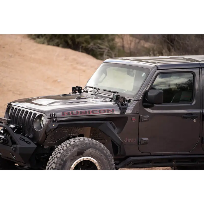 DV8 Offroad 18-22 Jeep Gladiator JT Cowl Light Bar Bracket featuring a Jeep Wrangler