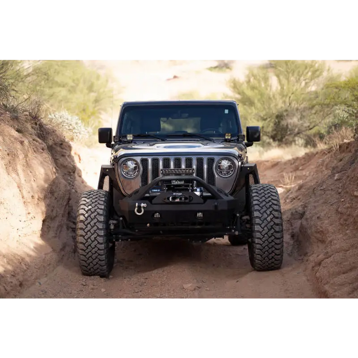 DV8 Offroad Jeep Gladiator JT Cowl Light Bar Bracket driving down dirt road