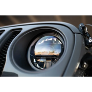 DV8 Offroad LED Projector Headlights for Jeep Wrangler with Close-Up of Front View Mirror