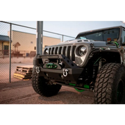 Green and black bumper on Jeep Wrangler LED Projector Headlights.