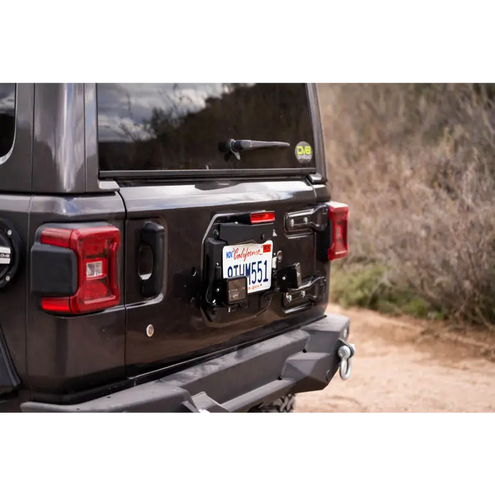 DV8 Offroad 18-22 Jeep Wrangler JL Spare Tire Delete Kit with License Plate on Black Jeep