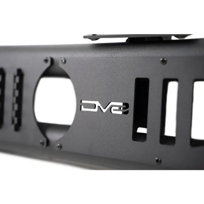 Black license plate with logo on DV8 Offroad 18-23 Jeep Wrangler JL 4 Door Body/Pinch Weld Mounted Step