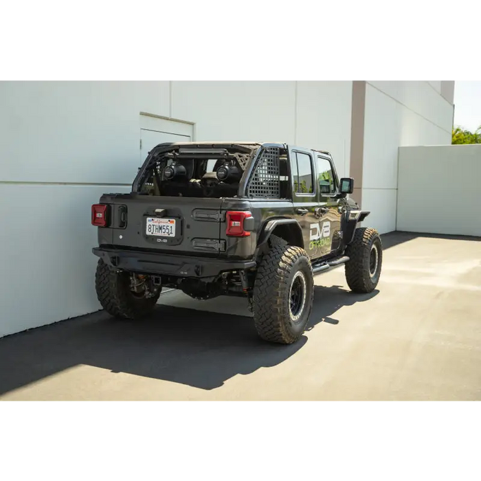 DV8 Offroad Jeep Wrangler JL 4 Door with Pinch Weld Mounted Step and Large Tire Rack