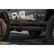 Black Jeep with green logo on DV8 Offroad 18-23 Jeep Wrangler JL 4 Door Body/Pinch Weld Mounted Step.