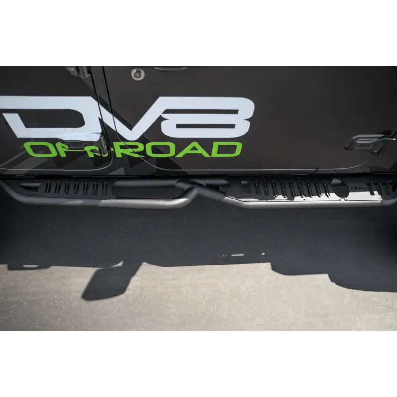 DV8 Offroad black truck front bumper with green lettering, Door Body Pinch Weld Mounted Step.