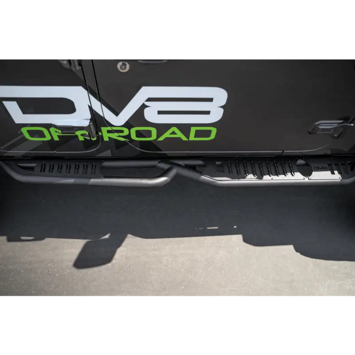 DV8 Offroad black truck front bumper with green lettering, Door Body Pinch Weld Mounted Step.