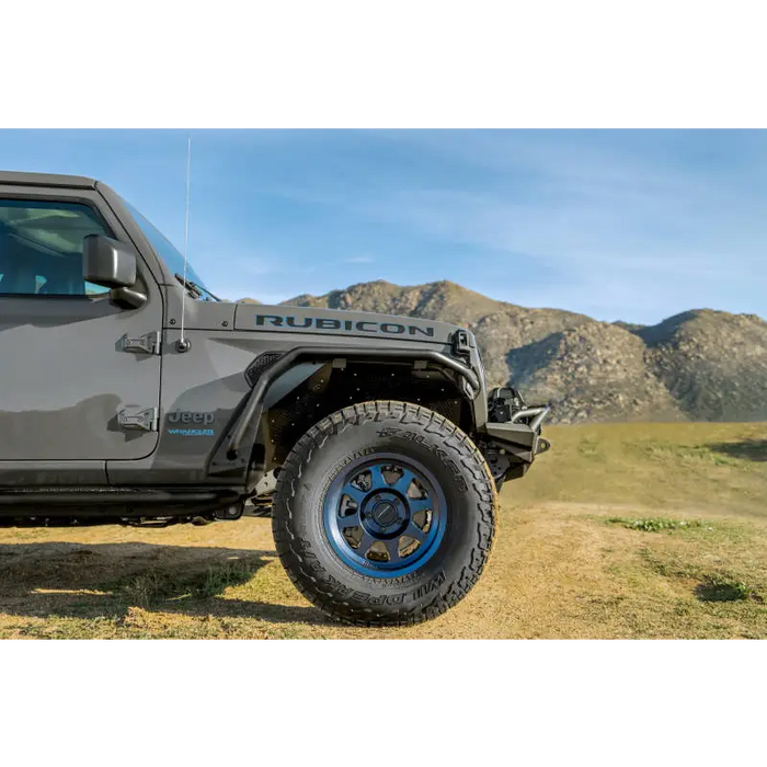 DV8 Offroad Spec Series Tube Fenders on Jeep with mountains in background
