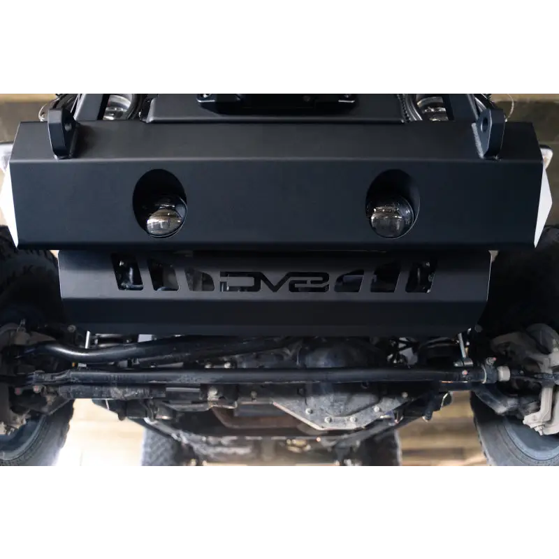 Close up of vehicle with large bumper - DV8 Offroad Jeep Wrangler JL/JT Front Bumper Sway Bar Disconnect Skid Plate