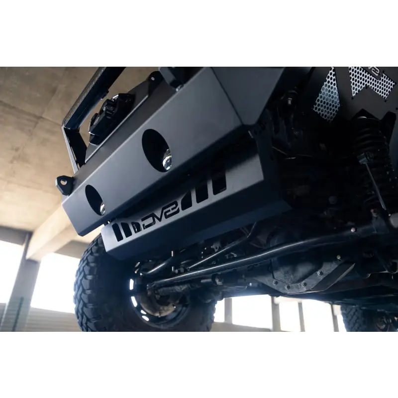 Black Jeep Wrangler JL/JT front bumper sway bar disconnect skid plate close up.