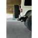 White truck with tire cover attached to DV8 Offroad FS-7 Series Rear Bumper