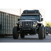 DV8 Offroad Spec Series Front Bumper parked Jeep in front of shipping container
