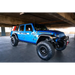 DV8 Offroad dual pod light mounts with jeep parked under bridge in parking garage