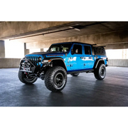 DV8 Offroad Dual Pod Light Mounts showcasing blue Arafed Jeep parked in garage