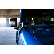 Blue car with side mirror displayed in DV8 Offroad 20-22 Jeep JL 392/Jeep JT Mojave Edition Dual Pod Light Mounts.
