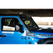Blue Jeep with black roof rack featuring DV8 Offroad A-Pillar Light Bar Mount.