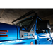 Blue truck with black door handle parked next to DV8 Offroad A-Pillar Light Bar Mount.