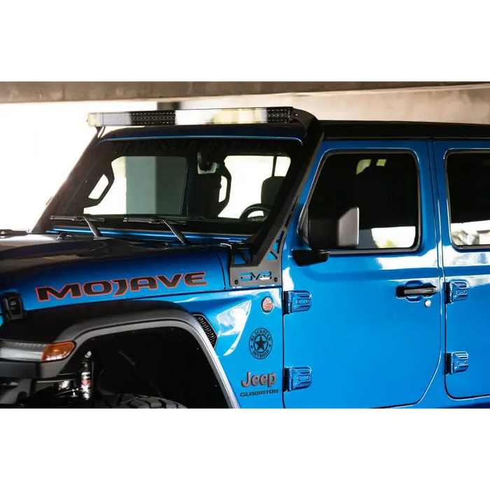 Blue and black/white top Jeep with DV8 Offroad A-Pillar Light Bar Mount