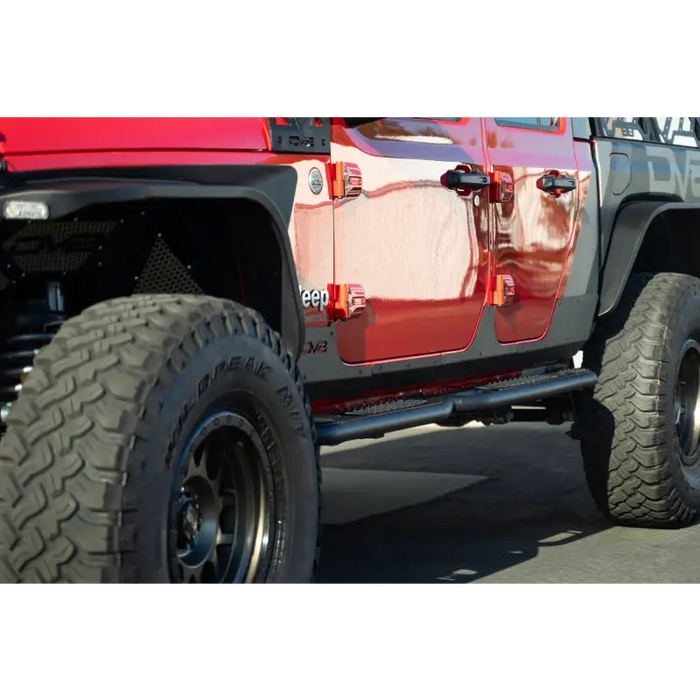 Red Jeep Gladiator JT with DV8 Offroad Rock Skins
