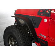 Red Jeep with black tire cover featuring DV8 Offroad 20-23 Jeep Gladiator JT Slim Fender Flares