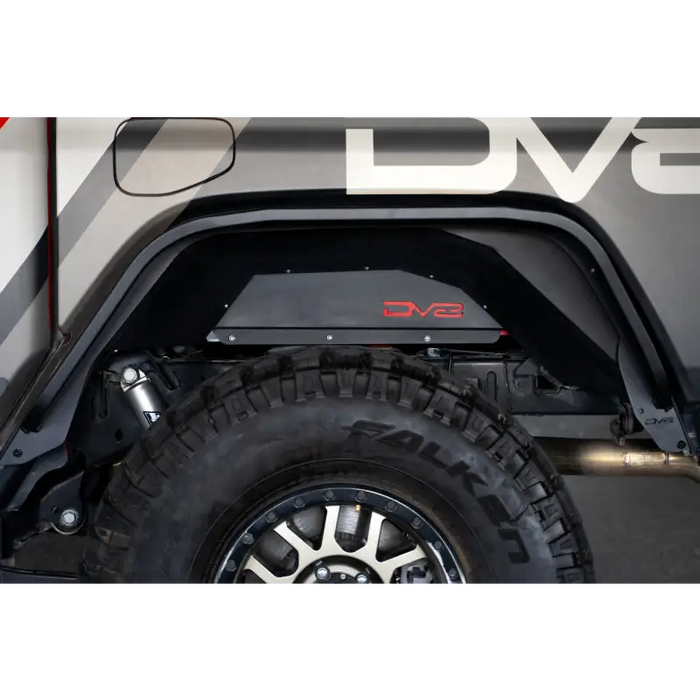 Close-up of truck with big tire on DV8 Offroad slim fender flares