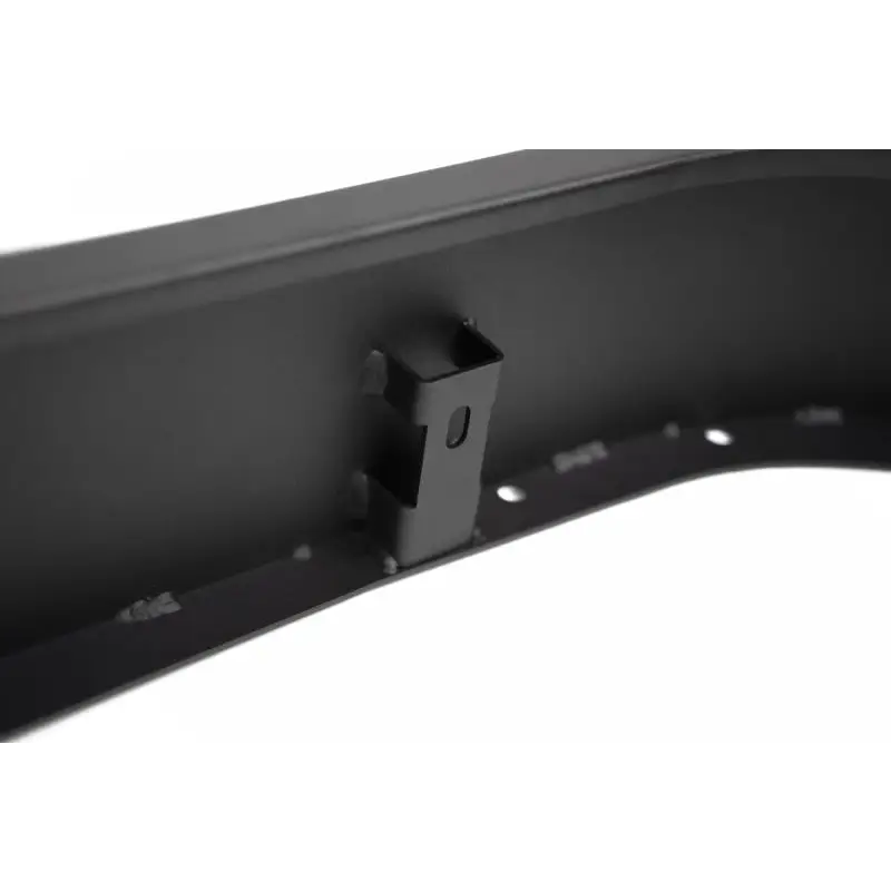 Black plastic door handle displayed on DV8 Offroad 20-23 Jeep Gladiator JT Slim Fender Flares.