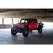 DV8 Offroad 20-23 Jeep Gladiator JT Slim Fender Flares in red Jeep parked under bridge in parking garage