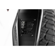 Close up of DV8 Offroad 20-23 Jeep Gladiator JT Spec Series Fender Flares bumper plate.