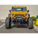Yellow Jeep parked in parking lot with DV8 Offroad 2007-2018 Jeep Wrangler Armor Style Fenders.