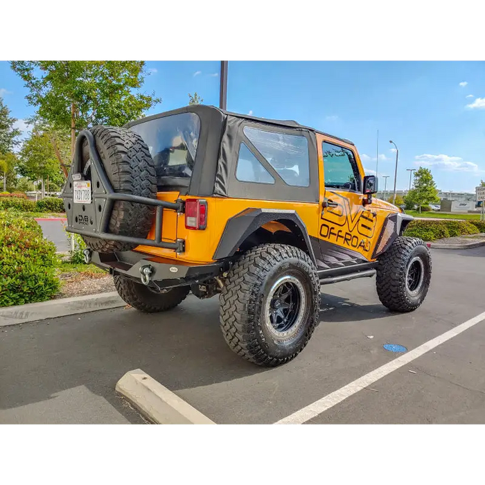 DV8 Offroad Jeep Wrangler with Large Front Tire & Armor Style Fenders