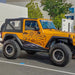 Yellow Jeep with black and orange decal on DV8 Offroad 2007-2018 Jeep Wrangler Armor Fenders
