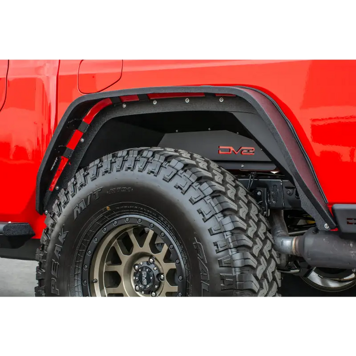 Red jeep with black tire and rim, DV8 Offroad Gladiator Rear Inner Fenders - Black.