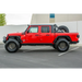 Red Jeep Gladiator with black bumper and wheels by DV8 Offroad.