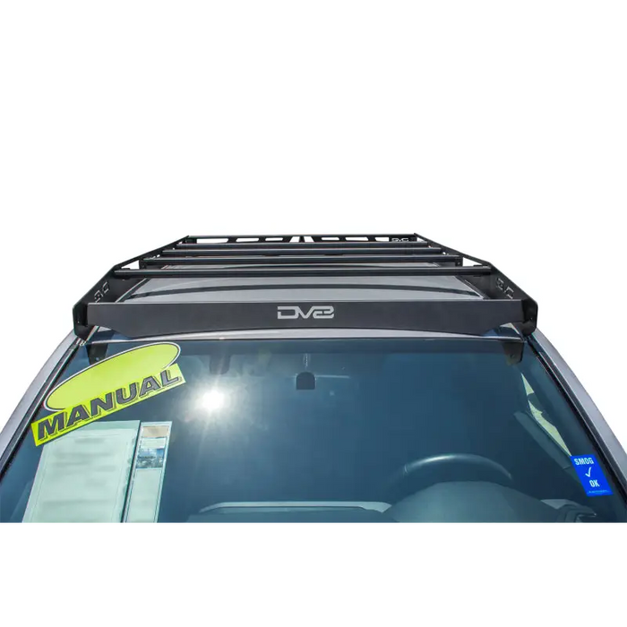 Yellow sticker on the roof of DV8 Offroad Toyota Tacoma Roof Rack