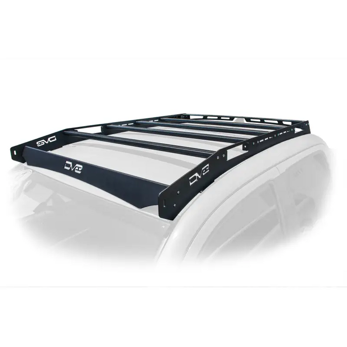 DV8 Offroad Toyota Tacoma Aluminum Roof Rack with black roof rack on white truck