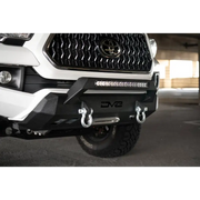 DV8 Offroad 2016+ Toyota Tacoma Center Bumper with front bumper bar mounted.