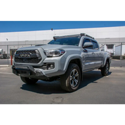 Grey Toyota Tacoma truck parked in lot with DV8 Offroad 2016+ Toyota Tacoma Center Bumper