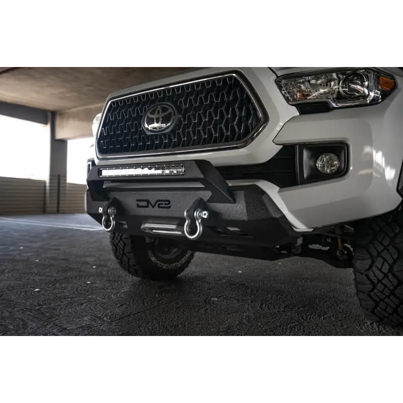 White Toyota Tacoma with black bumper from DV8 Offroad Tacoma Center Bumper