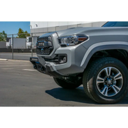 Silver Toyota Tacoma truck front end on DV8 Offroad 2016+ Toyota Tacoma Center Bumper.