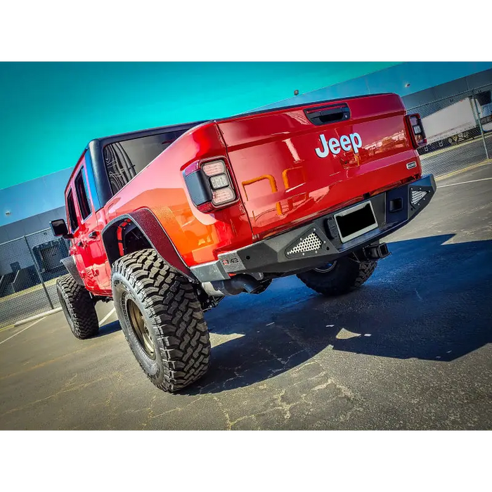 DV8 Offroad 2018+ Jeep Gladiator Rear Bumper with Red Jeep and Big Tire