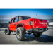 Red Jeep Gladiator rear bumper with big tire by DV8 Offroad