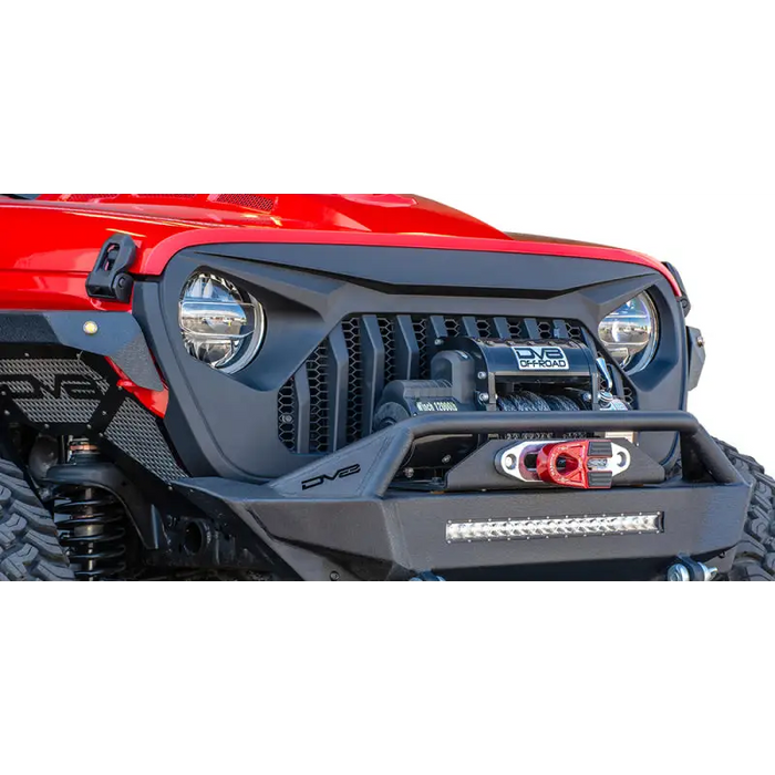 Close up of red Jeep with black bumper, DV8 Offroad 2018+ Jeep JL/Gladiator Angry Grill.